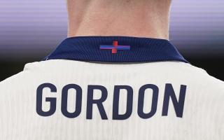 the St George's Cross detail on the back of the shirt of England's Anthony Gordon during the