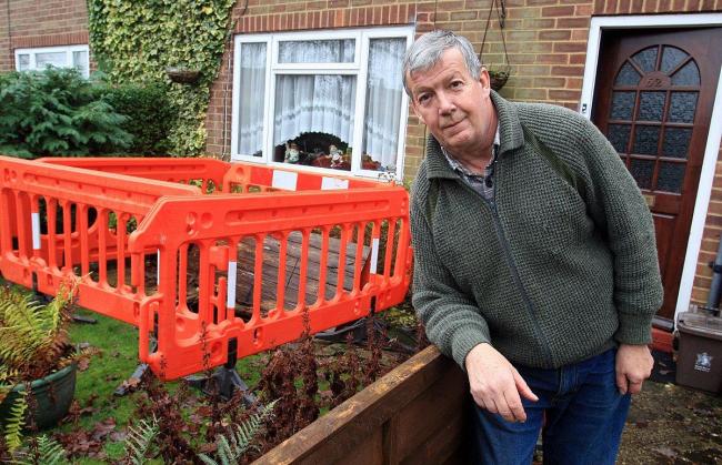 Sinkhole 'starting to spread' outside Ted Rolfe's home in Holtspur