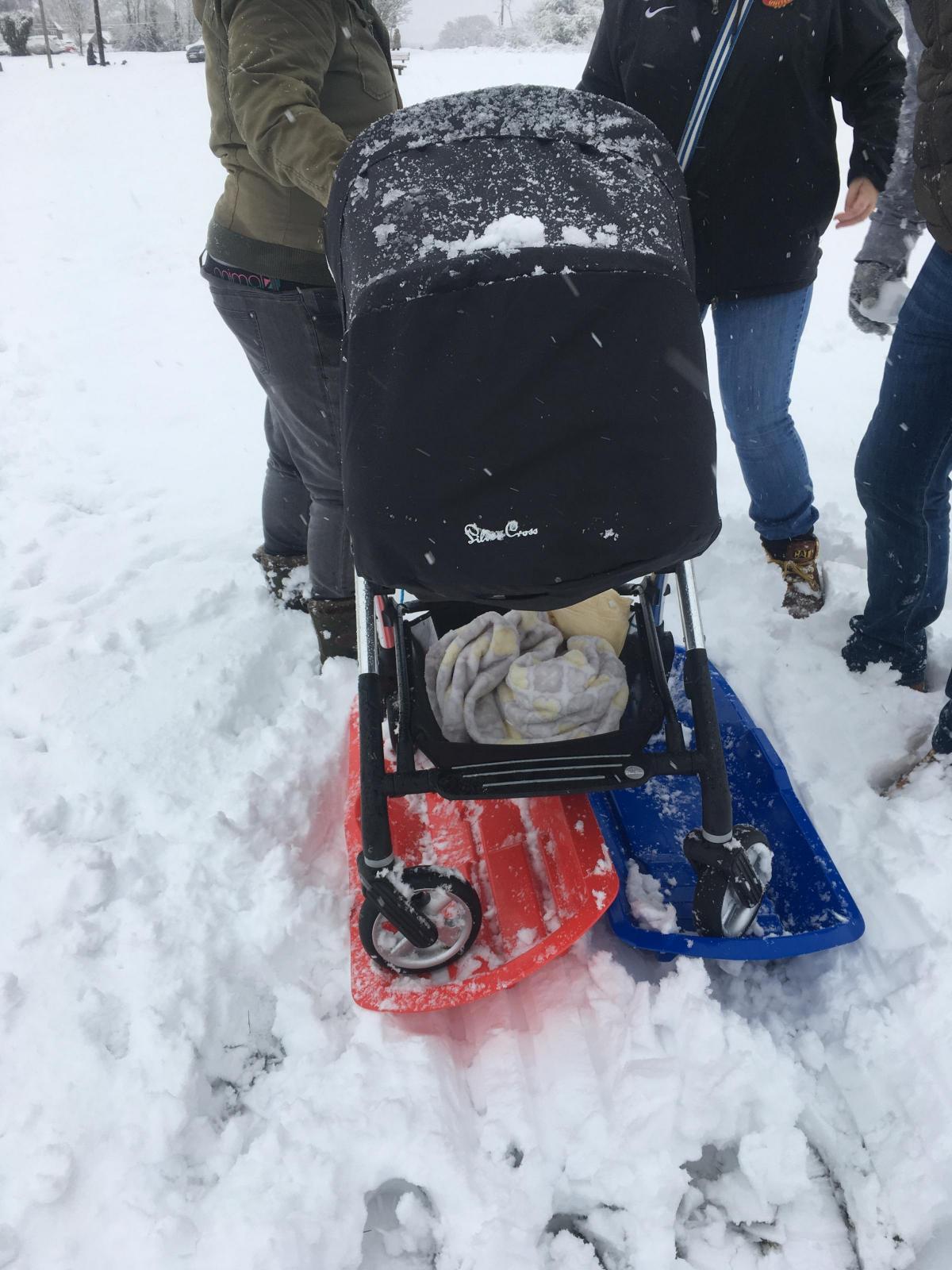 Kate Tully: "This was the only way we could get out and about to enjoy the snow in Lane End today with a pushchair!"