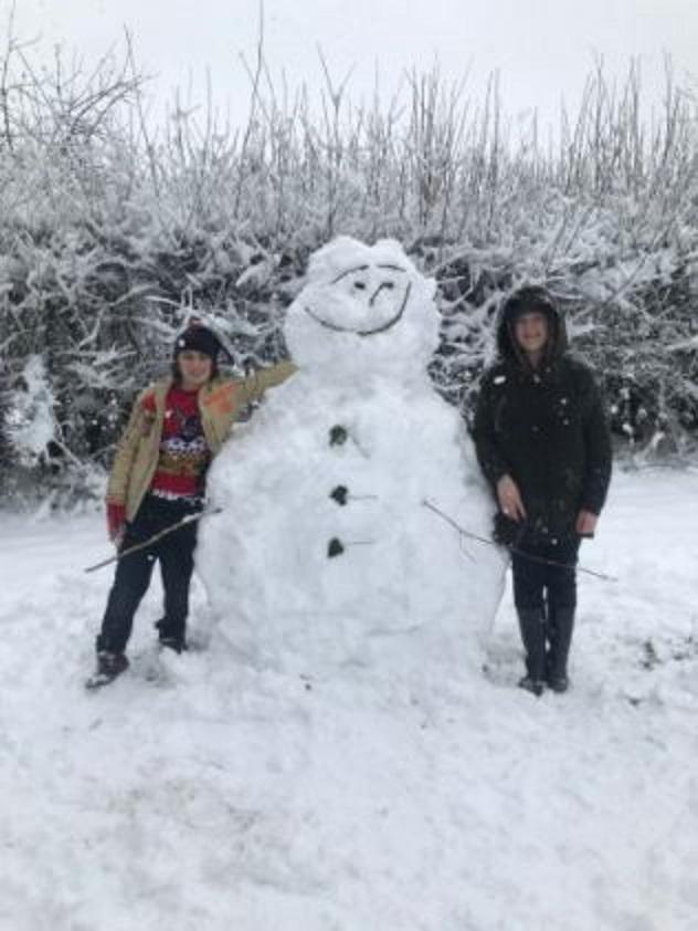 Picture by Jeremy ODonnell - altar servers enjoying the snow after the service at Our Lady’s