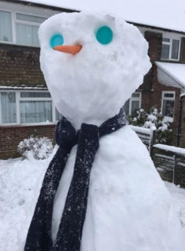 Twitter user @onerealmasters - "Tallest #snowman in the whole world, actually, probably just the whole of Downley..."