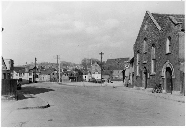 Looking east from near Newland Methodist Church, the view after slum clearance, the area becoming a car park. Newland Street, High Wycombe. April 1936
