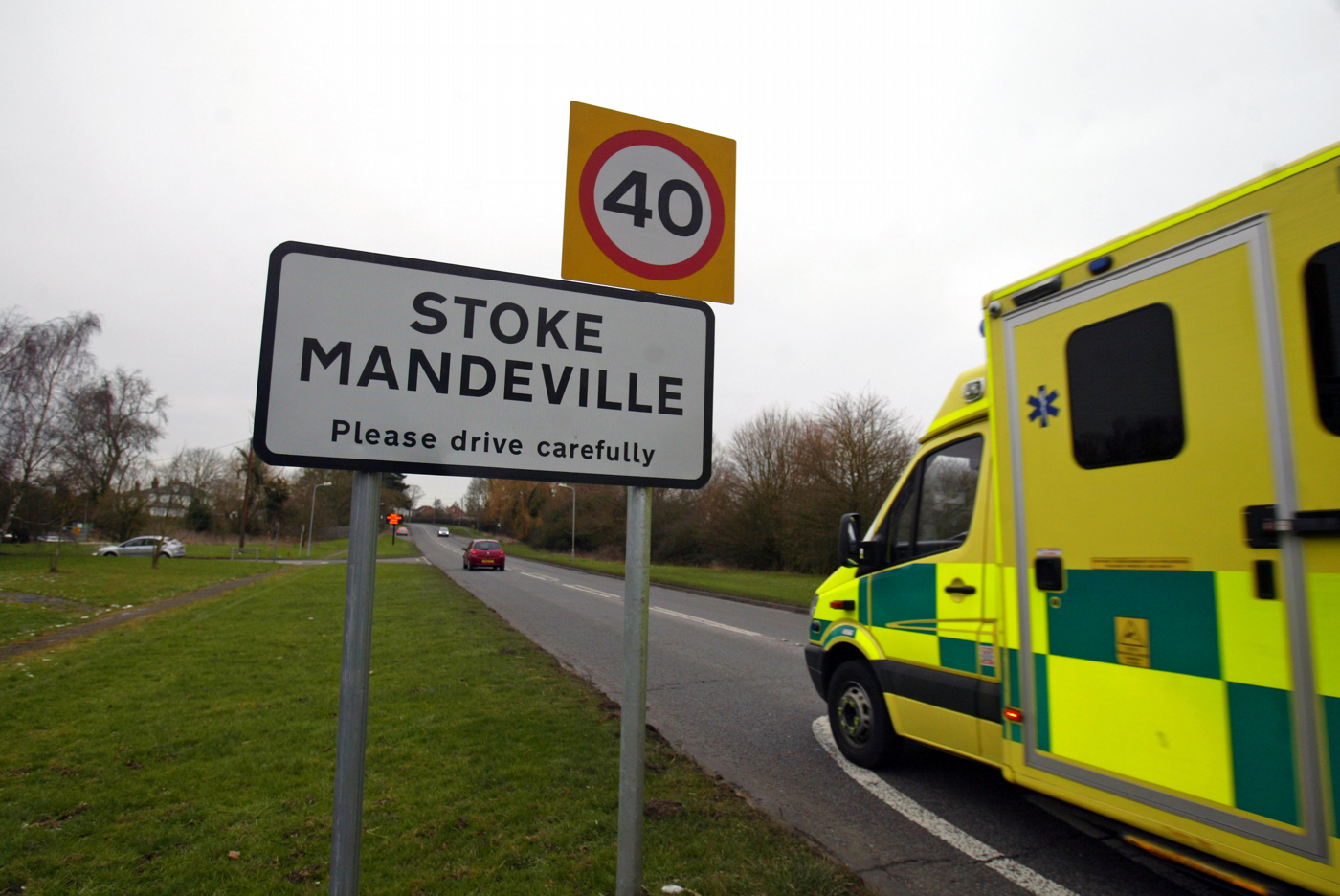 08/02/2012.Ambulance on the road into Stoke Mandeville ...and a bus just incase.By Anita Ross Marshall for News.
